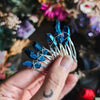 TINY BLUE COMB[S]